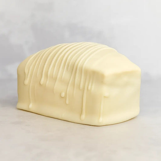 Blanki Man Keto bizcochito keto relleno de manjar y bañado en chocolate blanco, sin gluten ni azúcar y bajo en carbohidratos