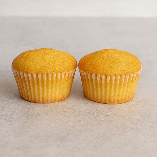 Dos Muffin Keto de limón sin gluten y sin azúcar, elaborado con harina de almendras y endulzado con alulosa 100%
