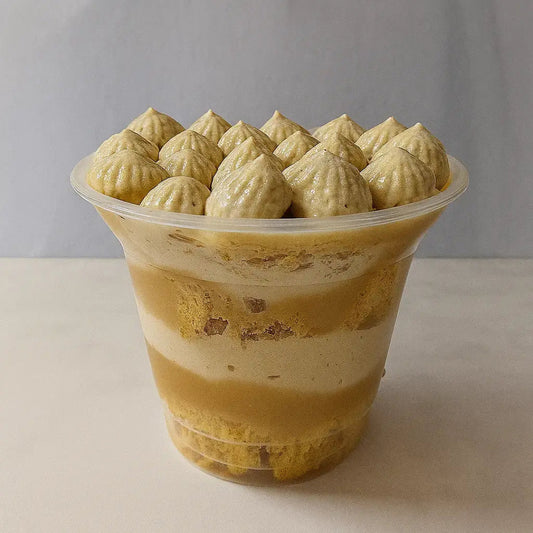 Torta Vaso Lúcuma Keto con bizcocho de almendras, manjar keto y crema de lúcuma.